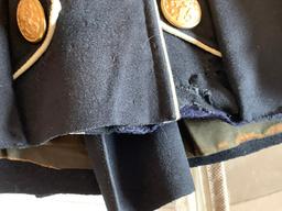 Blue double breasted frock coat with red cuffs and collars