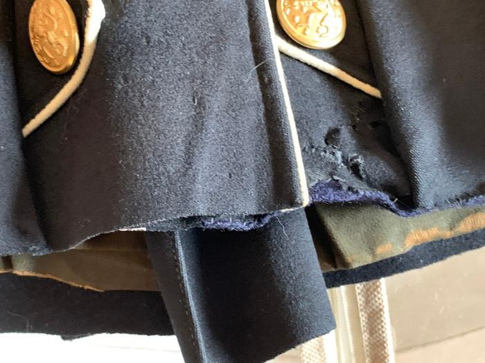 Blue double breasted frock coat with red cuffs and collars