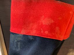 Blue double breasted frock coat with red cuffs and collars