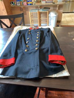 Blue double breasted frock coat with red cuffs and collars