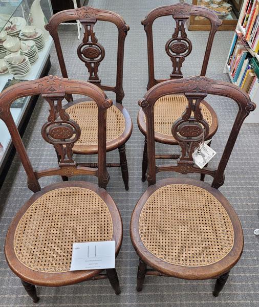 Four wood chairs, cane seats