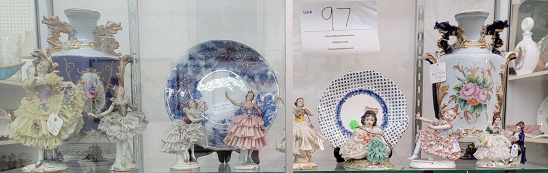 Two porcelain vases, two small plates, eight Dresden figurines