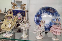 Two porcelain vases, two small plates, eight Dresden figurines