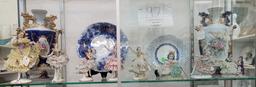 Two porcelain vases, two small plates, eight Dresden figurines