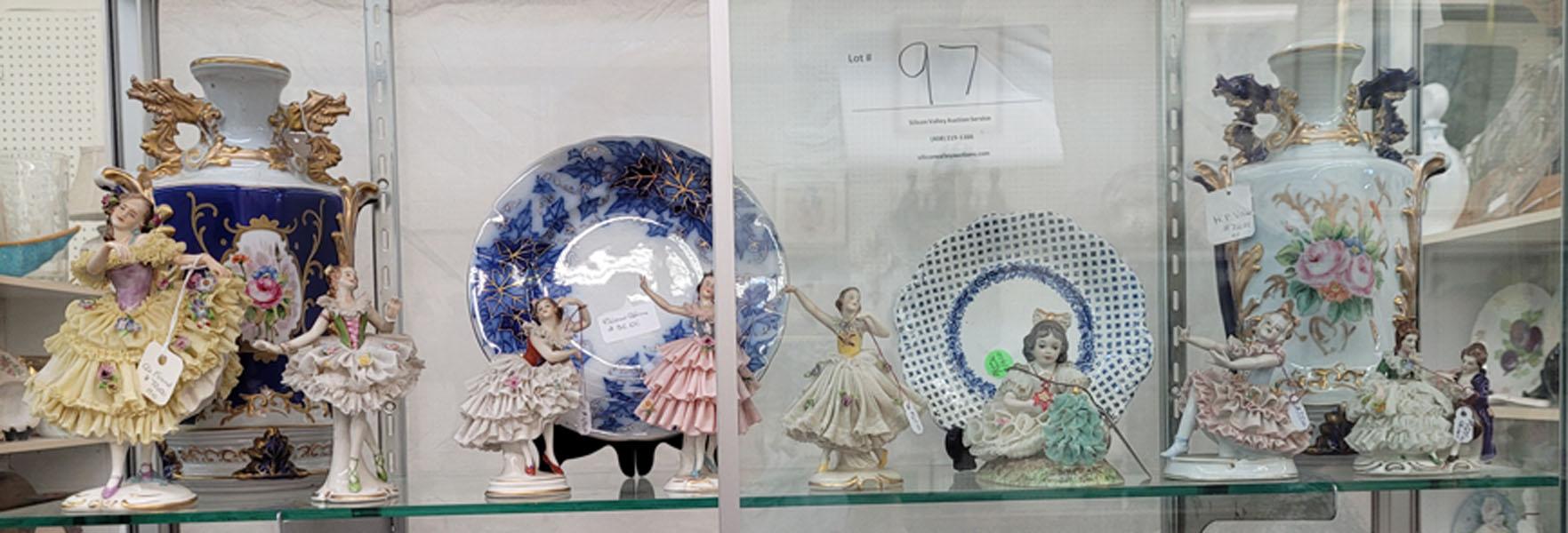 Two porcelain vases, two small plates, eight Dresden figurines