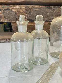 Lot of Beakers and Chemical Bottles