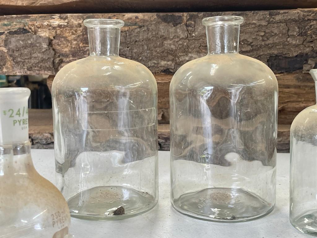 Lot of Beakers and Chemical Bottles