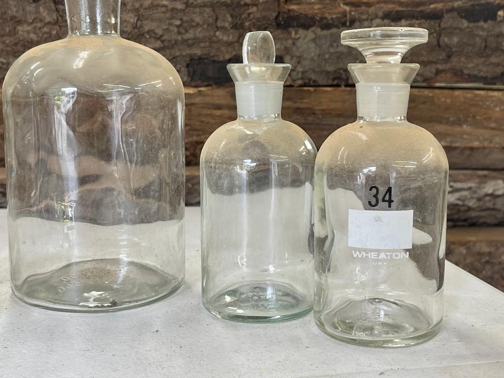 Lot of Beakers and Chemical Bottles