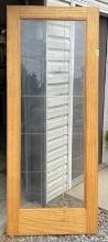 Wooden Door with a Cut Grooves Glass Panel