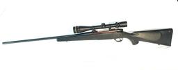 Weatherby Mark V 7MM WBY Caliber Bolt Action Rifle With 6.5X20 Leupold Scope