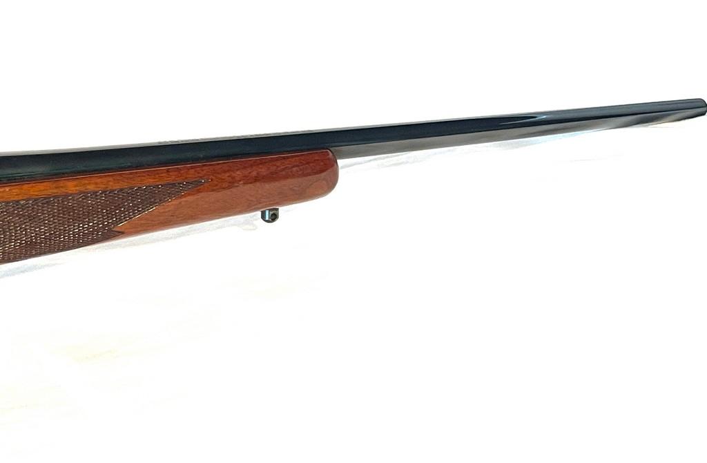 Ruger Model 77 220 Swift Cal. Bolt Action Rifle With Scope Rings