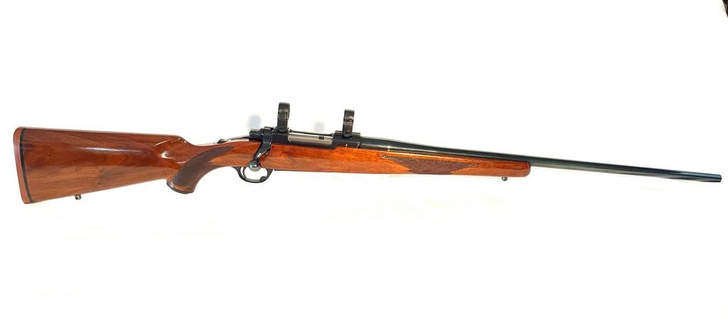 Ruger Model 77 220 Swift Cal. Bolt Action Rifle With Scope Rings