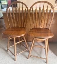 Two Swivel Oak Bar Stools