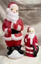 Two Smaller Santa Blow Molds