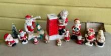 Lot of Bisque and Ceramic Santa Figurines