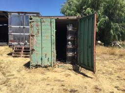 40’ connex with rusty door. All contents included