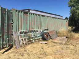 40’ connex with rusty door. All contents included