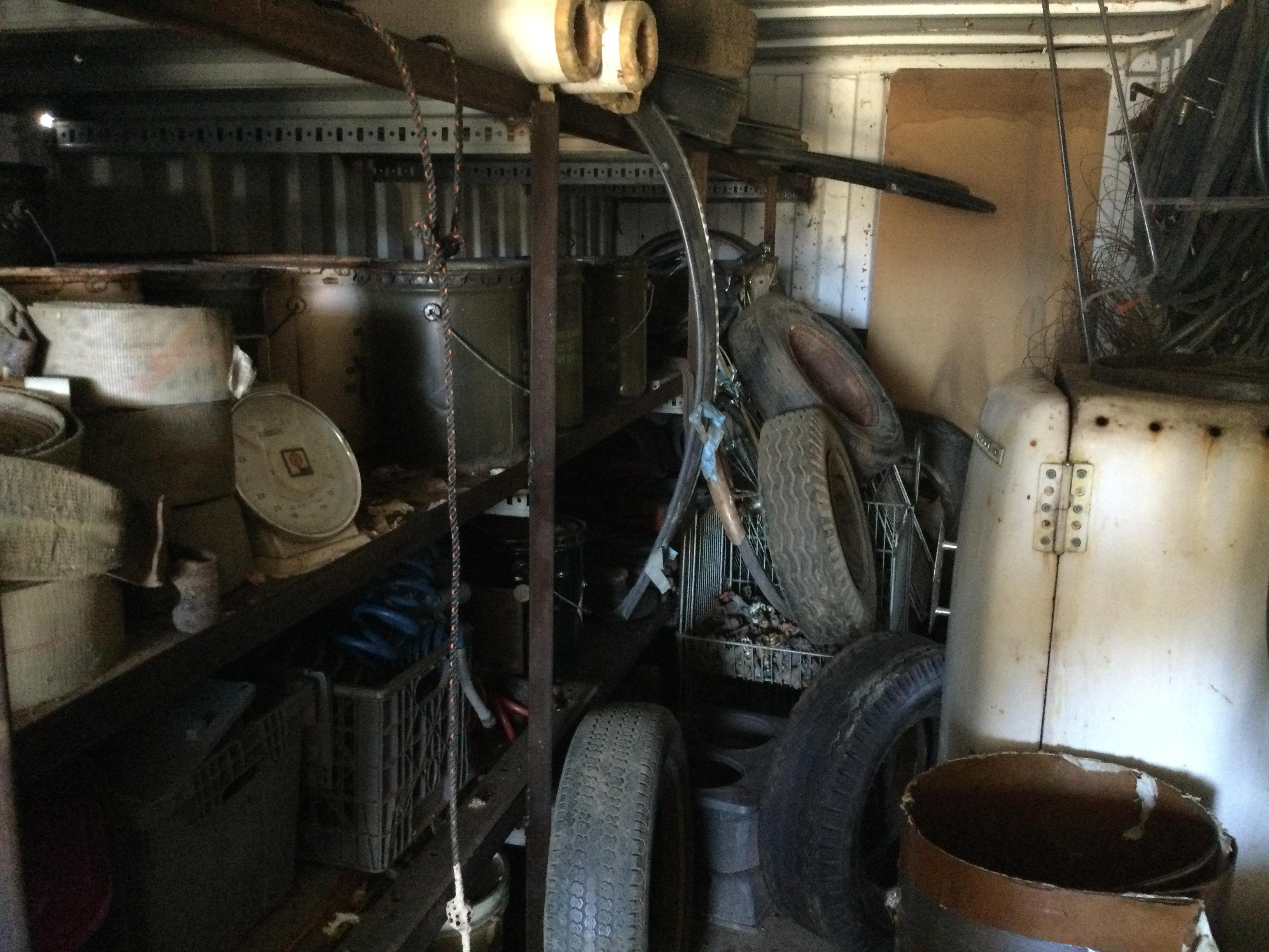 40’ connex with rusty door. All contents included