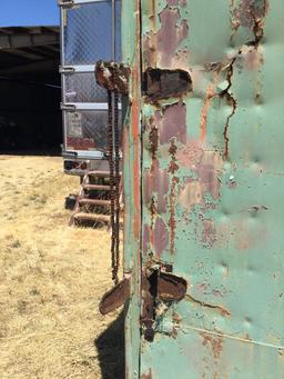 40’ connex with rusty door. All contents included