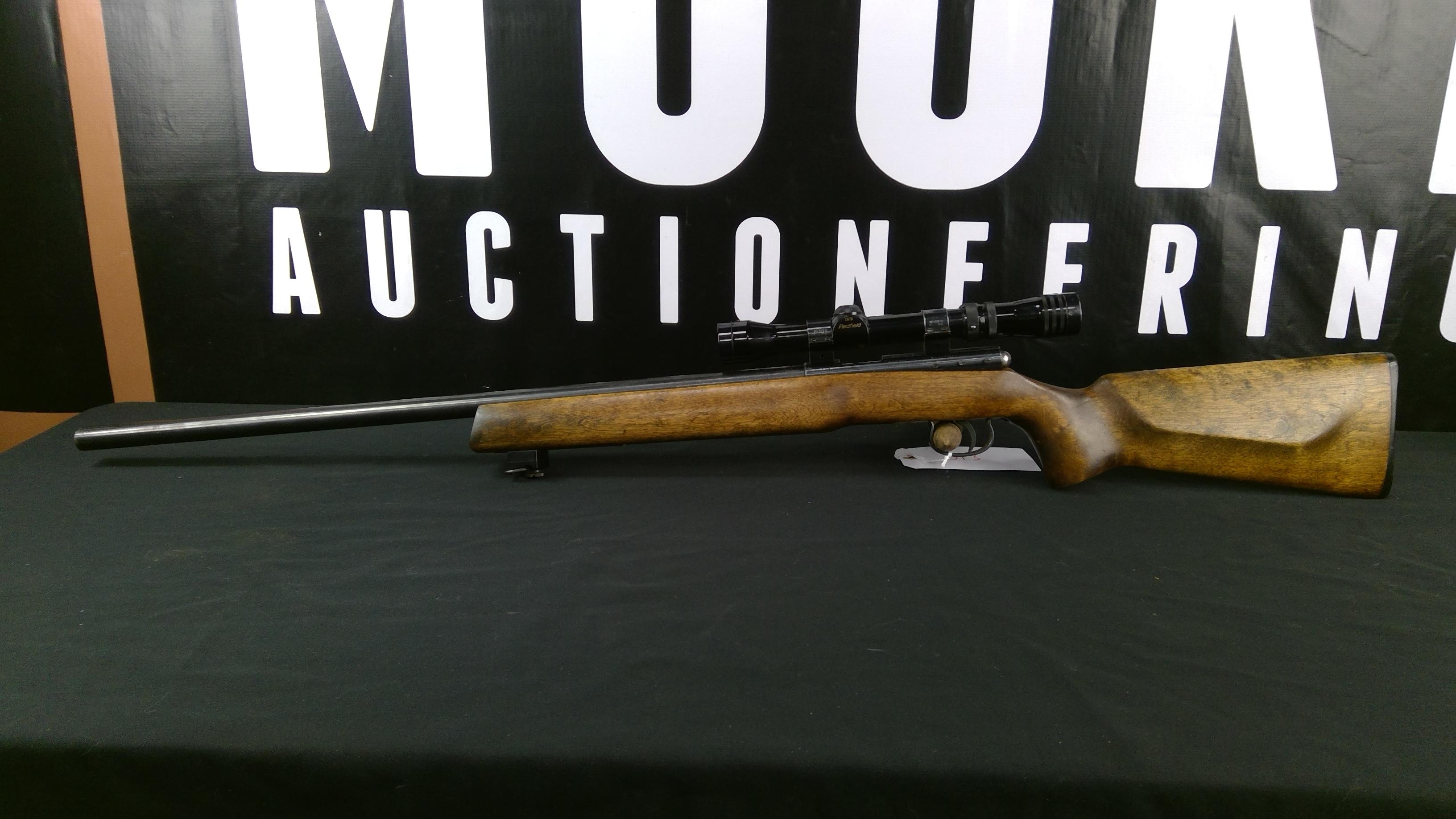 Savage Anschütz .22LR with 2-7x Redfield Scope. Has a cracked Stock