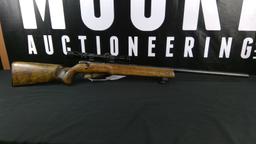 Savage Anschütz .22LR with 2-7x Redfield Scope. Has a cracked Stock