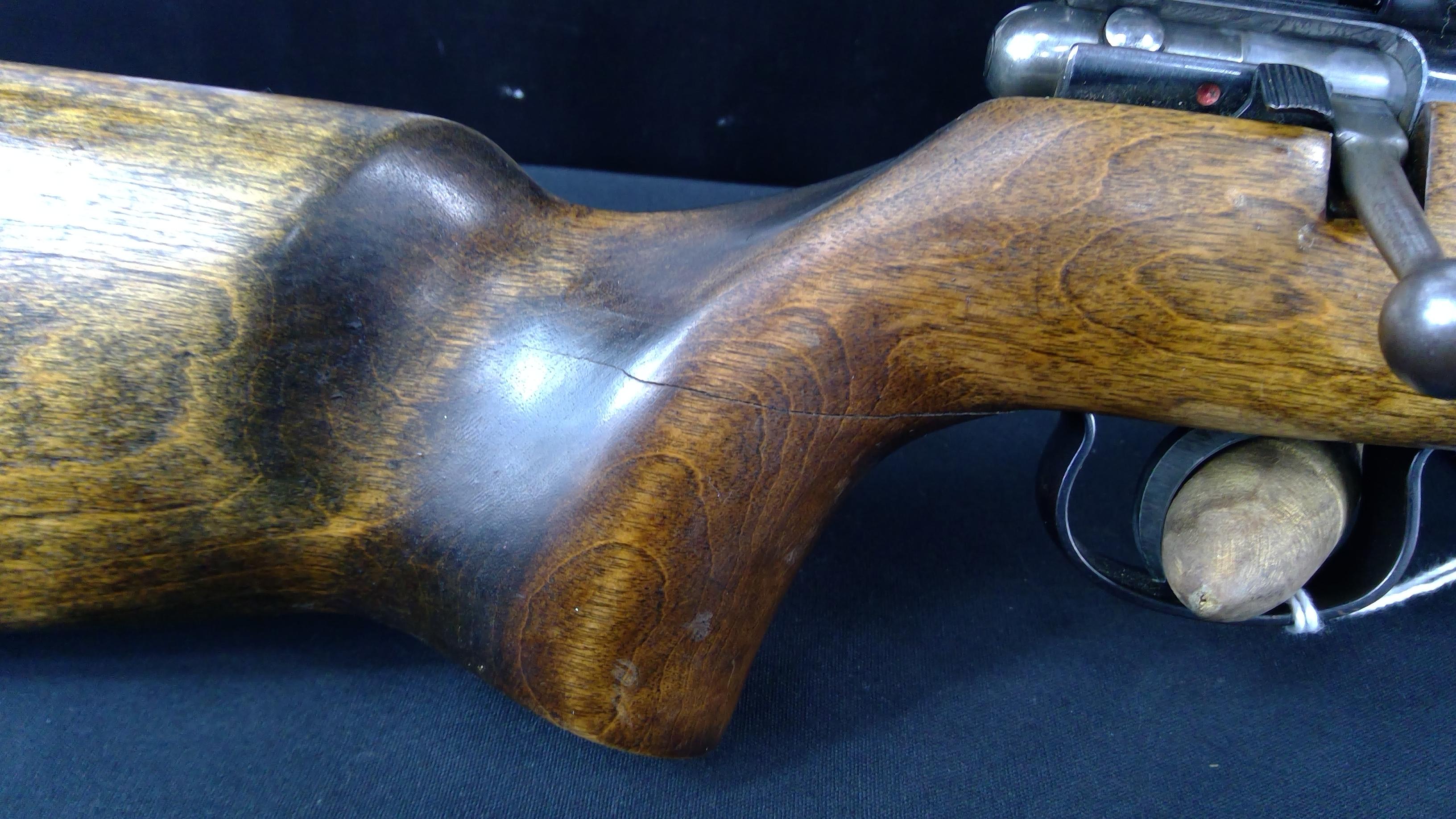 Savage Anschütz .22LR with 2-7x Redfield Scope. Has a cracked Stock