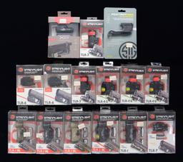 ASSORTMENT OF STREAMLIGHT MOUNTED FLASHLIGHTS.
