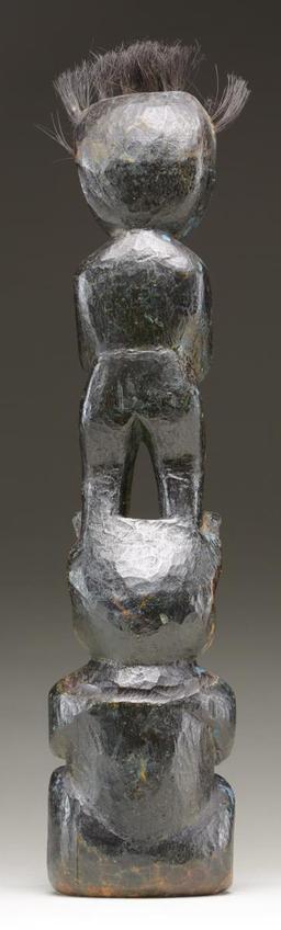 SMALL CARVED TOTEM.