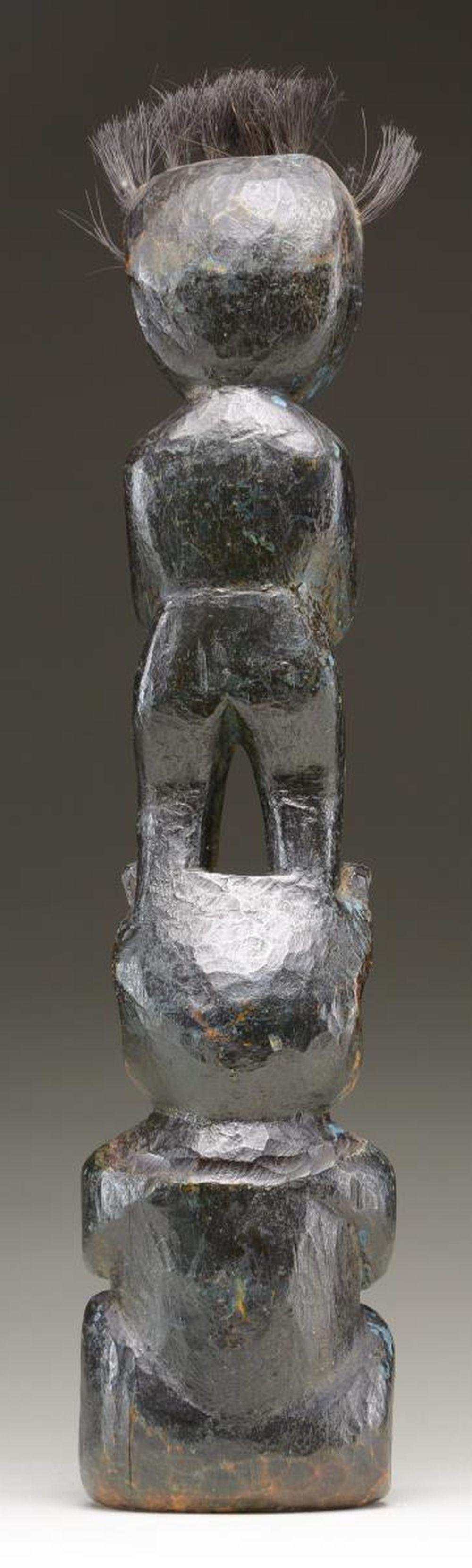 SMALL CARVED TOTEM.