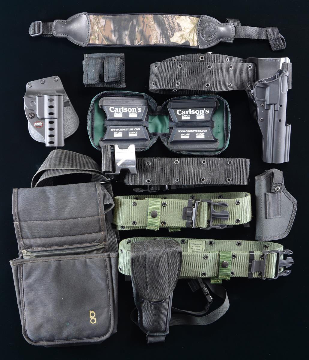 FINE GROUPING OF HOLSTERS AND ACCESSORIES.