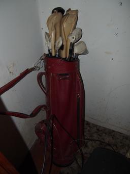Golf caddy and clubs