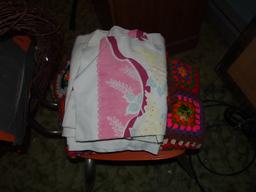 Assorted quilts and blankets