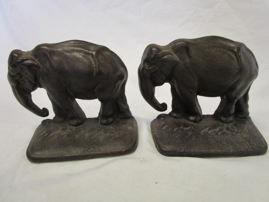 Vintage cast iron elephant bookends - trunk down
