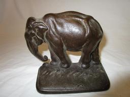 Vintage cast iron elephant bookends - trunk down