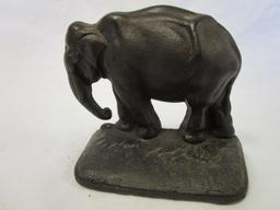 Vintage cast iron elephant bookends - trunk down