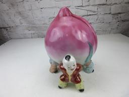 Porcelain Peach Held by Three Chinese Children