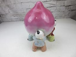 Porcelain Peach Held by Three Chinese Children