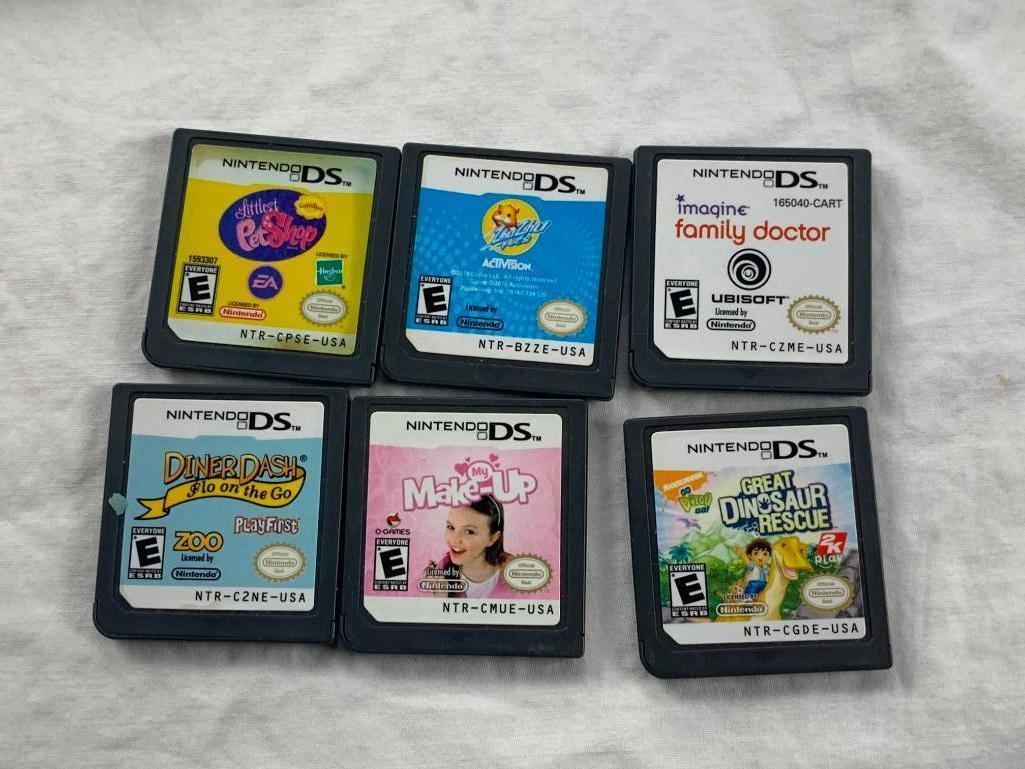 Nintendo DS-Lite Coral Pink Game Console Bundle with 14 Games
