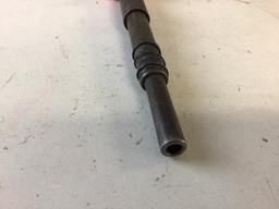 Remington Nail Driver, use 22 shell and a hit on the top with hammer to drive nails into cement
