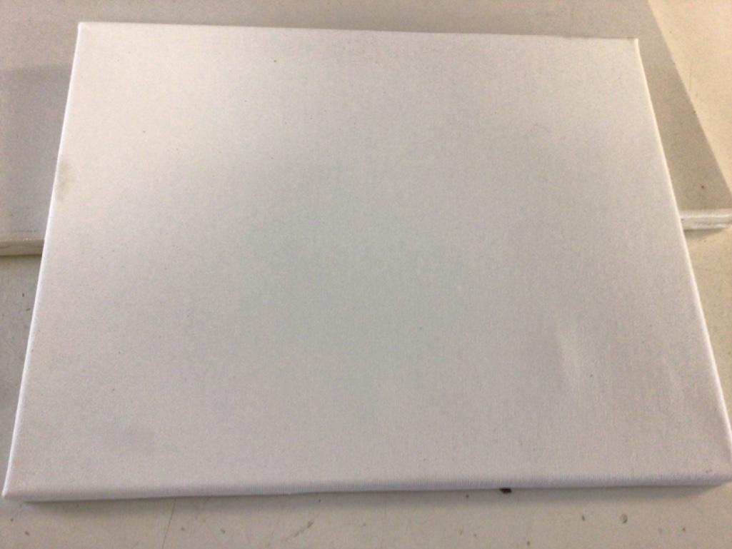 Lot of four various size canvas painting boards & one birch painting 18?x18? panel