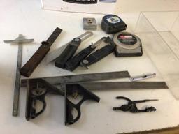 Lot of Measuring tools, includes four angle (one is vintage), two tape measures, two protractors ,