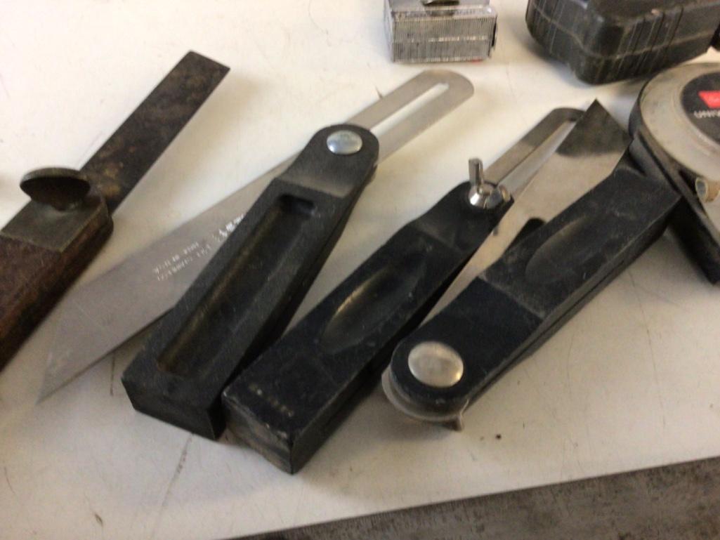Lot of Measuring tools, includes four angle (one is vintage), two tape measures, two protractors ,