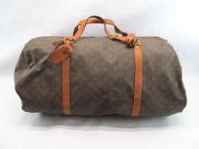 Torn Louis Vuitton Duffle Bag