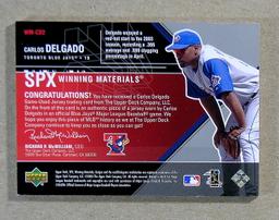 2003 Upper Deck SPX GAME WORN JERSEY Baseball Card #WM-CD2 Carlos Derlgado