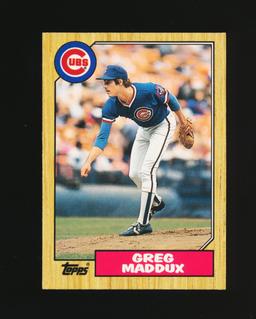 1987 Topps Traded ROOKIE Baseball Card #70T Rookie Hall of Famer Greg Maddu