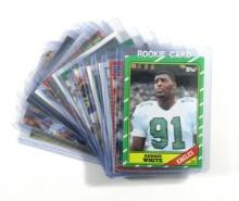 (12) Hall of Famer Reggie White Football Cards including 1986 ROOKIE Card