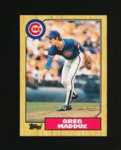 1987 Topps Traded ROOKIE Baseball Card #70T Rookie Hall of Famer Greg Maddu