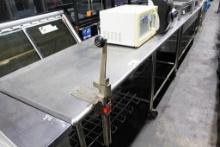 USED 8FT STAINLESS STEEL TABLE W/ COMMERCIAL CAN OPENER
