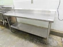 6FT X 24IN. STAINLESS STEEL TABLE W/ BACKSPLASH