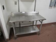 4FT STAINLESS STEEL TABLE - 24IN DEEP